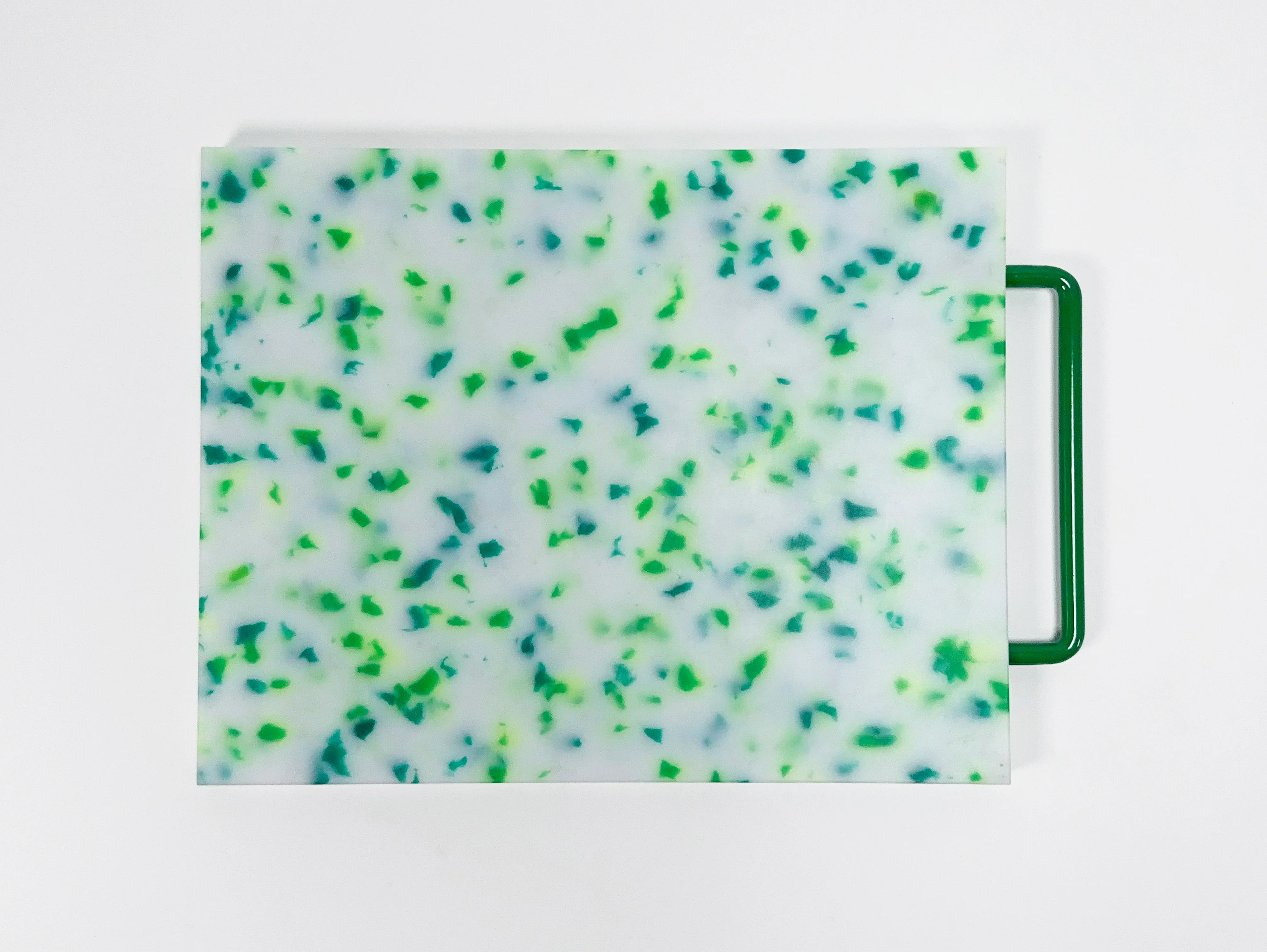 Planche à découper de confettis colorés