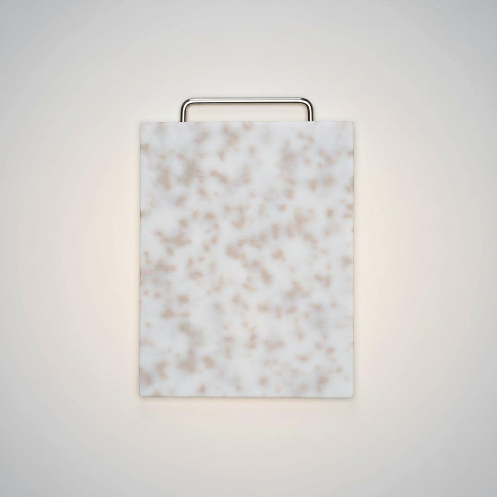 Marble-patterned cutting board on a white background