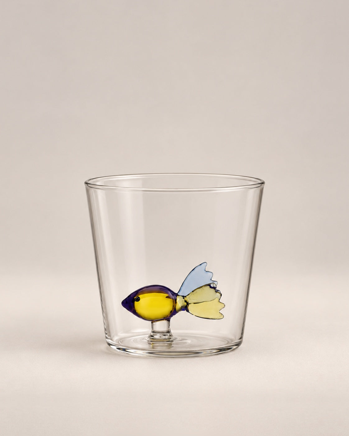 Fish Animal Farm Tumbler, a clear glass tumbler with a little glass fish inside, photographed in the Son of Rand studio