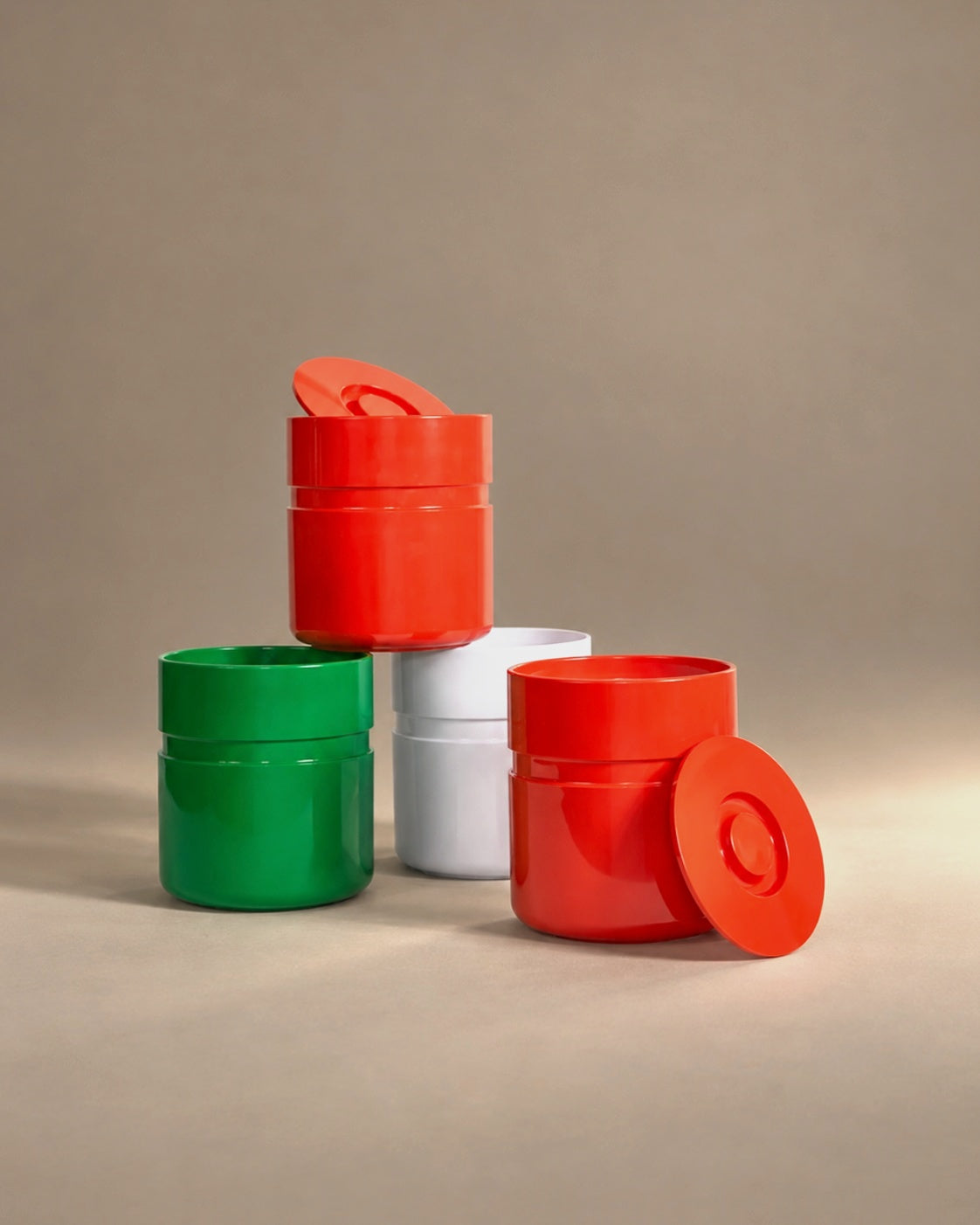 Asti ice buckets in green, white and red orange, studio photo