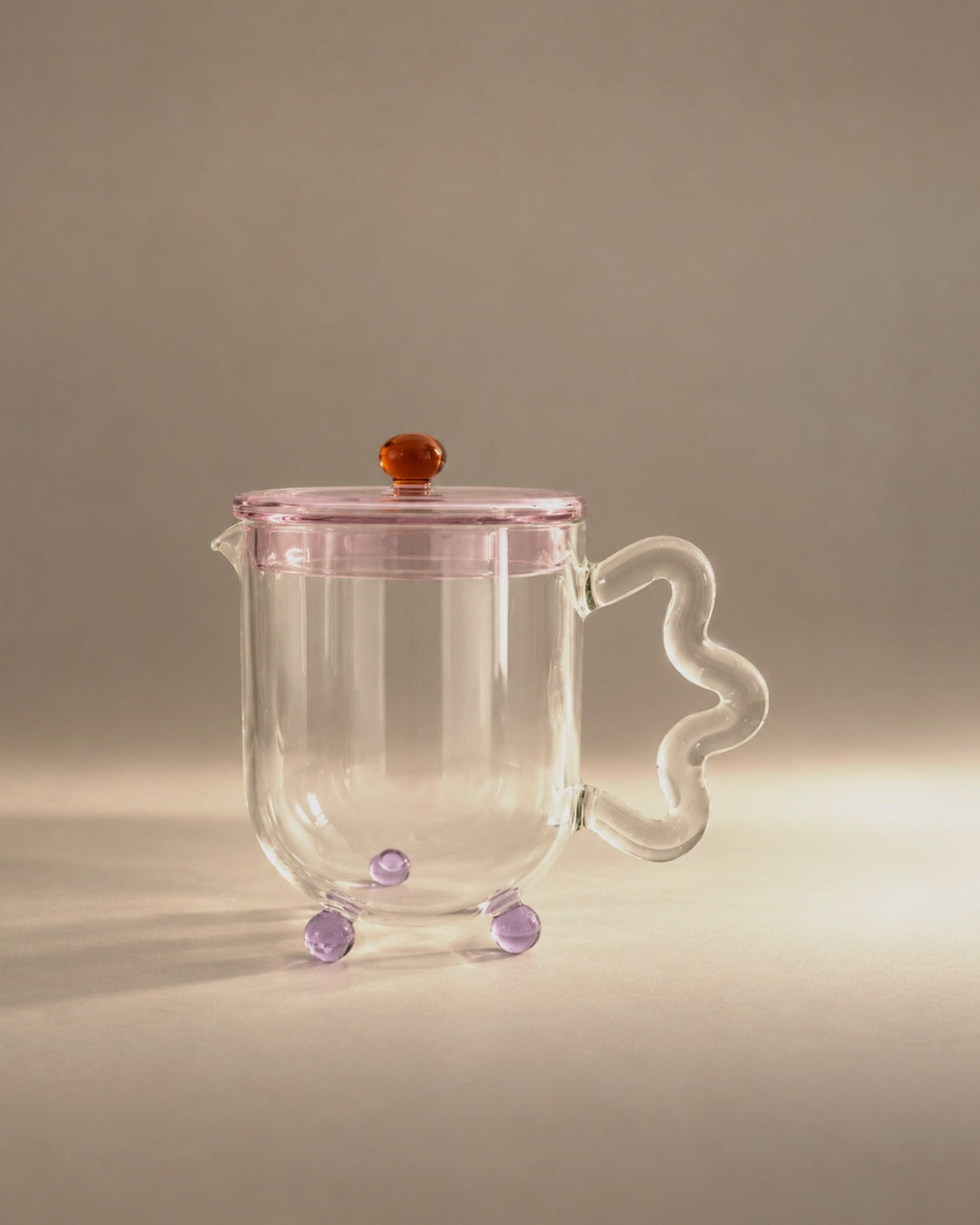 Bloom Teapot in Multi, pink lid and lilac feet, studio photograph