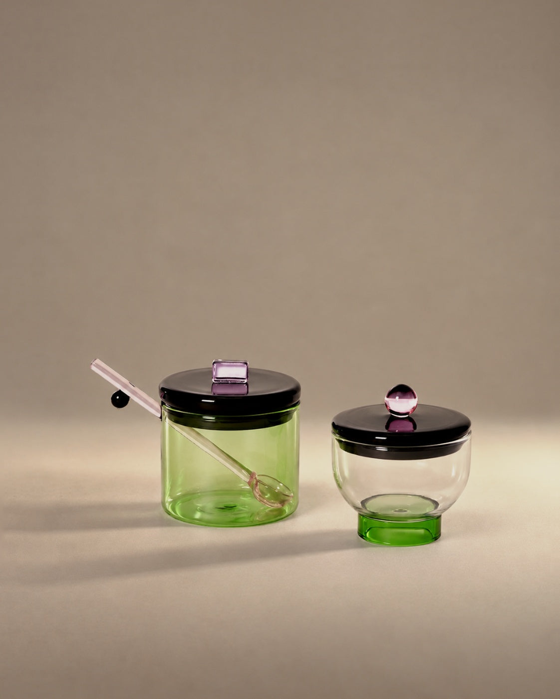 Everything Nice Salt and Sugar Bowls in green and clear glass with black lids, photographed in the Son of Rand studio