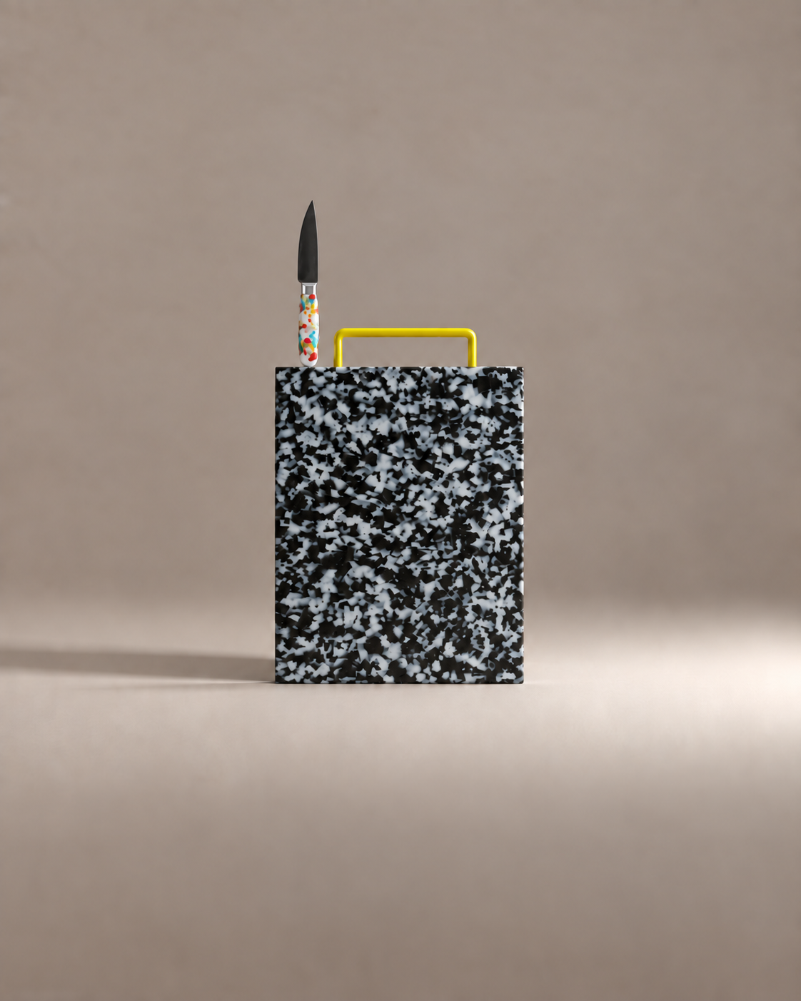 First Cut Gift Set: a black and white speckled cutting board with a confetti paring knife