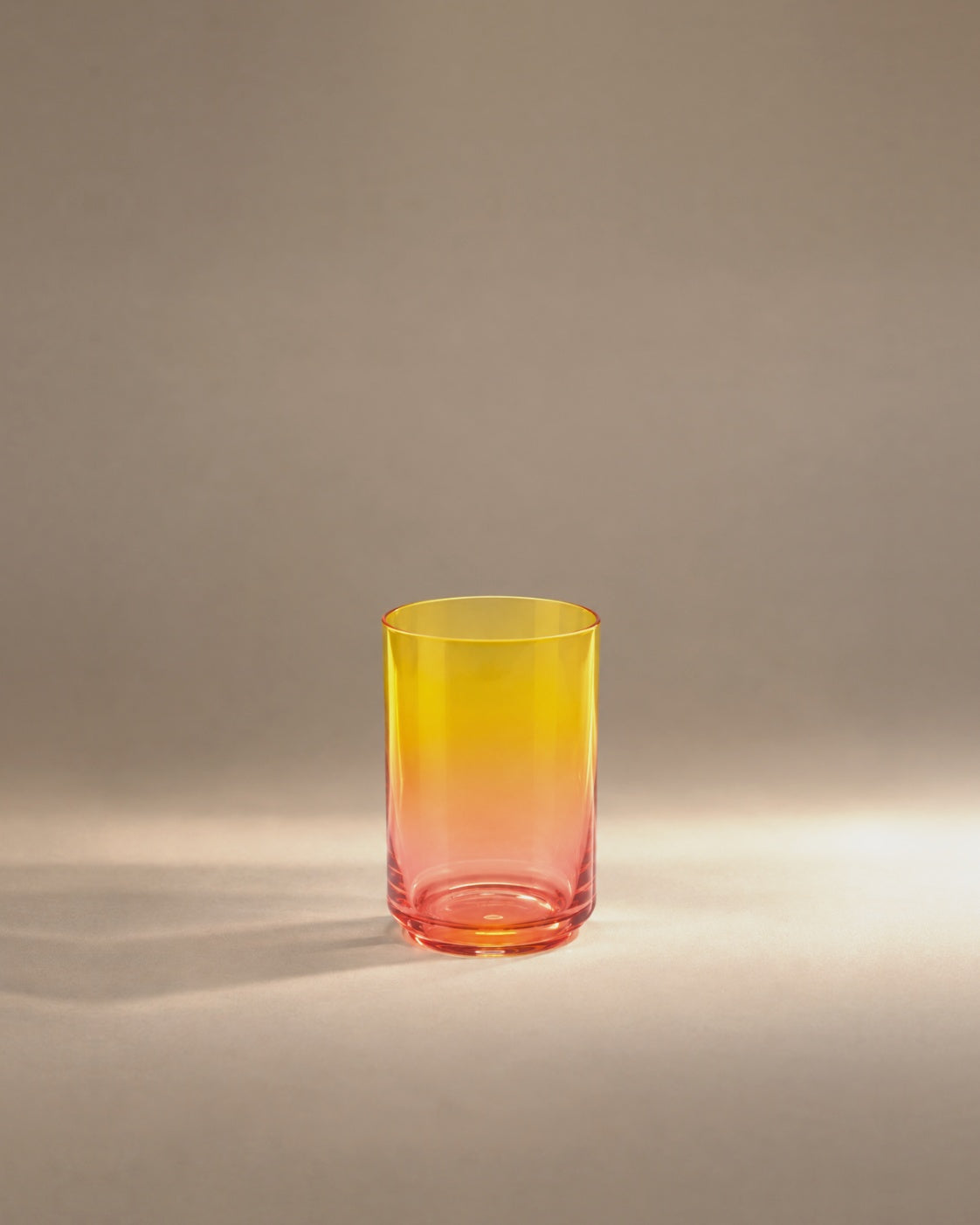 Gradient Glass in Montecito, yellow fading to coral, photographed in the Son of Rand studio