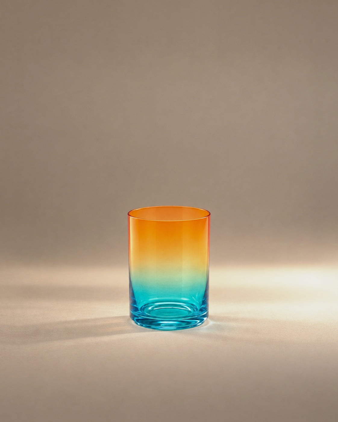 Gradient Glass in Kohala, orange fading to turquoise, photographed in the Son of Rand studio
