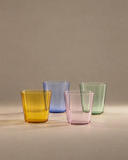 High Rise Tumbler in amber, light blue, pink and green, studio photograph