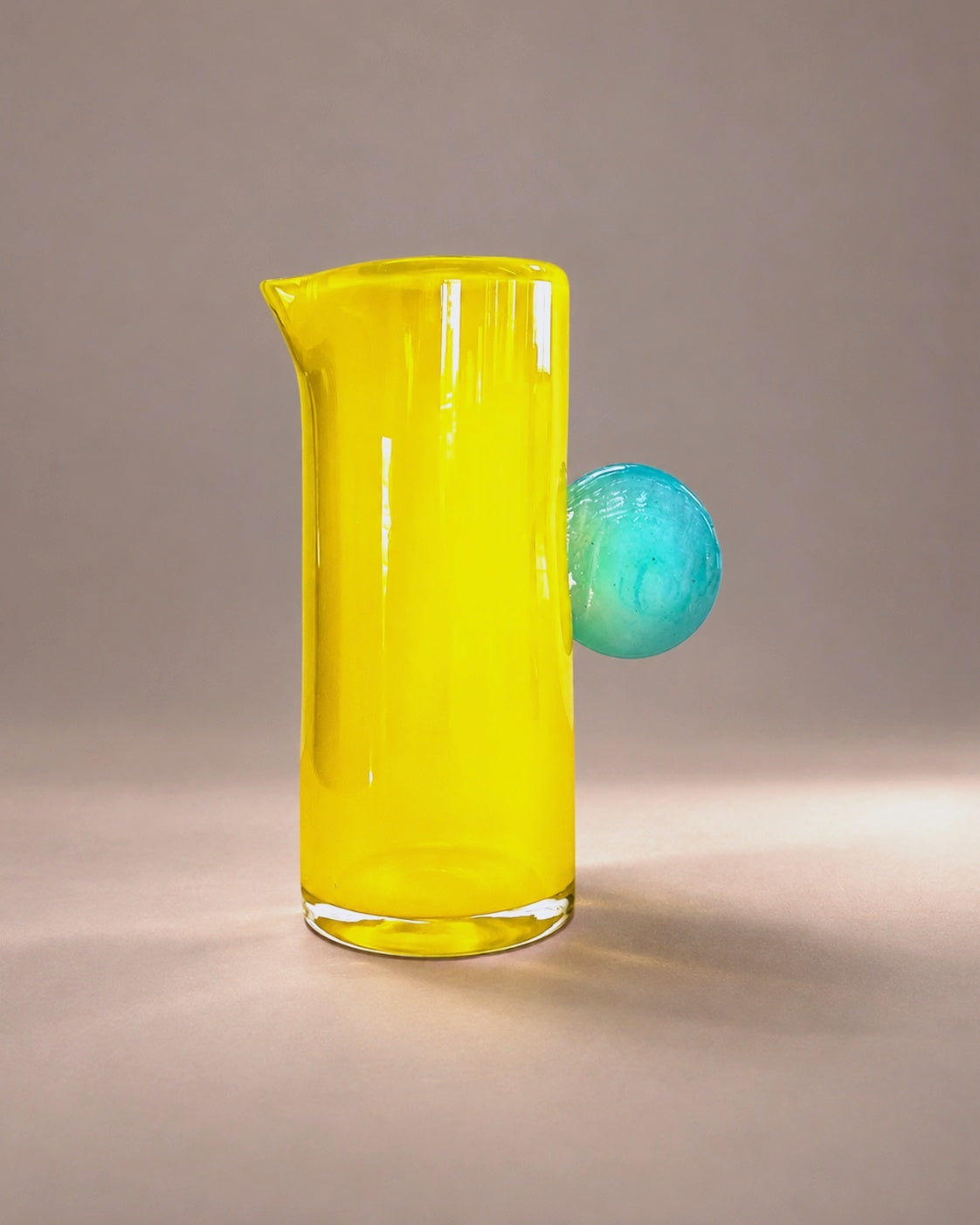 Dot Pitcher in Aquamarine + Lemon by Sticky Glass x Son of Rand, photographed in the Son of Rand studio