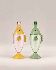 Marine Garden Fish Bottles in pink and green, glass bottles shaped like upright fish, photographed in the Son of Rand studio