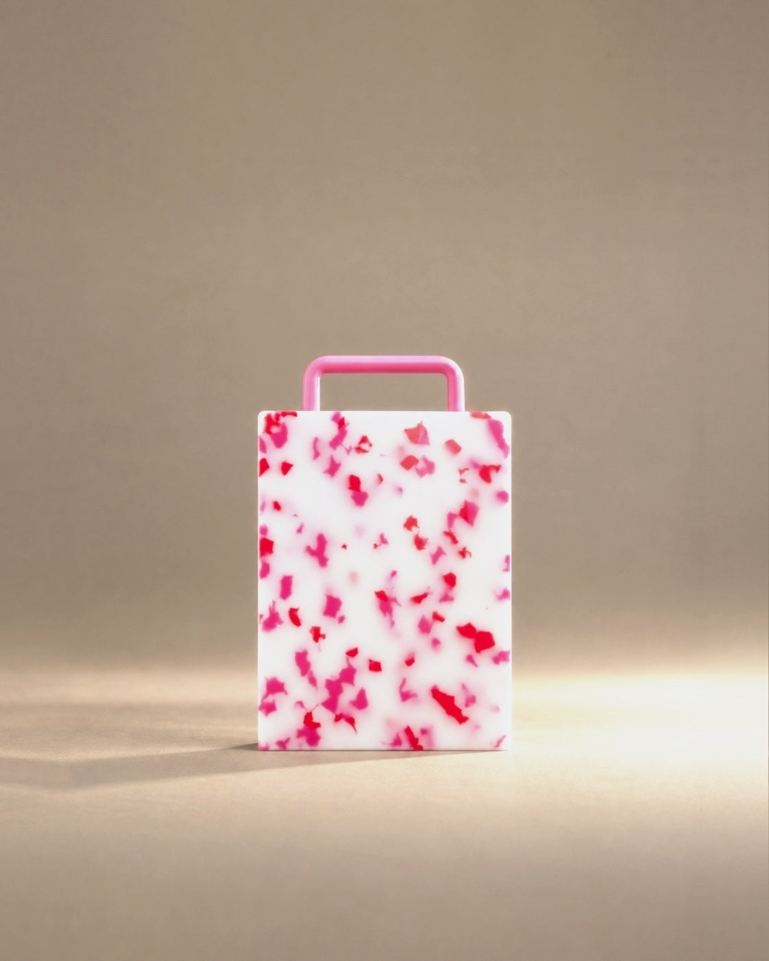 Mini cutting board in pink confetti, studio photo
