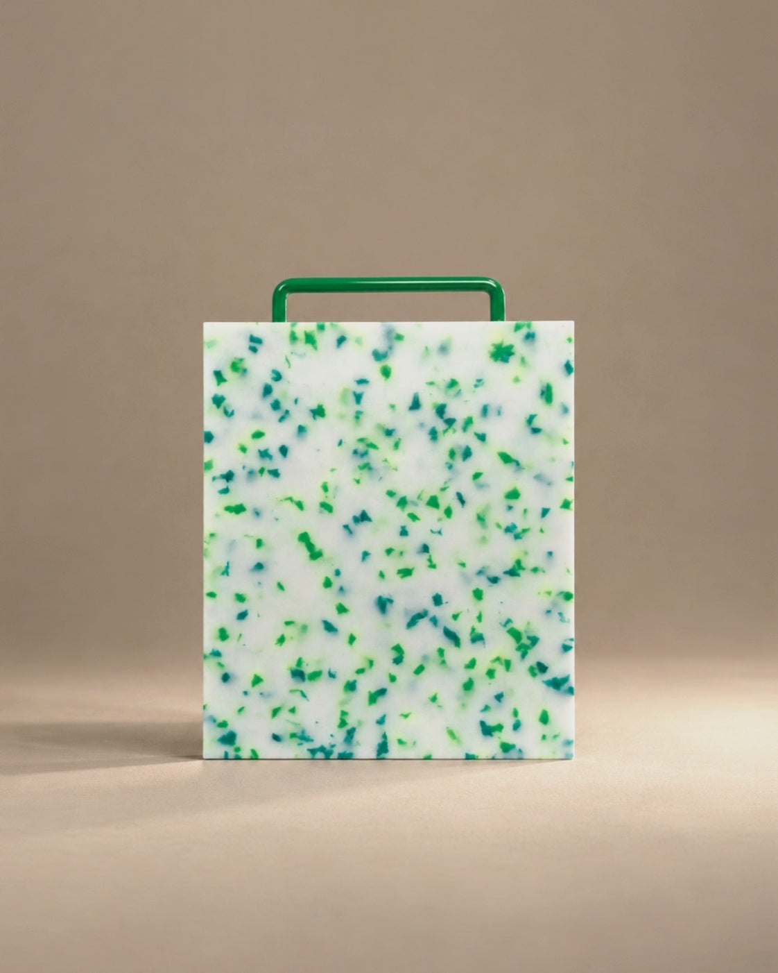 Monochromatic cutting board in green, studio photo