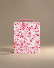 Monochromatic cutting board in pink, studio photo