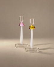 Mushroom candle holders in pink and amber glass on white stems, photographed in the Son of Rand studio
