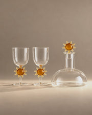 Soleil gift set wine glasses and carafe with amber suns, studio photo
