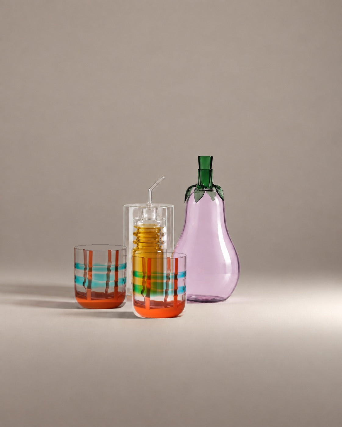 Sunday Supper Gift Set: a glass eggplant bottle, a ringed olive oil bottle and two turquoise and red banded tumblers